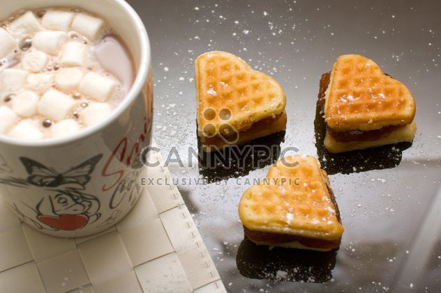 Sweet breakfast, heart shaped waffles and cocoa with marshmallows - бесплатный image #182667