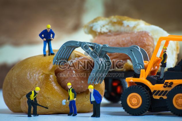 Tiny workers on bakery - Free image #183457