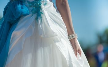 bride holding wedding dress gown - image gratuit #186317 