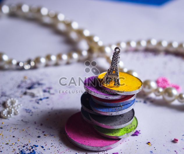 Colored eye shadows and small Eiffel tower - Free image #187197