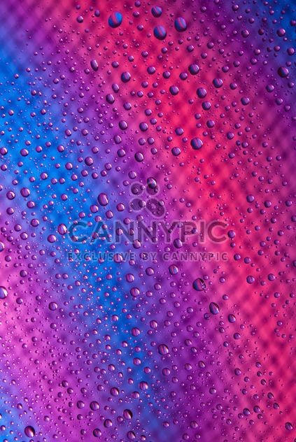 Water drops on abstract colored background - бесплатный image #187687