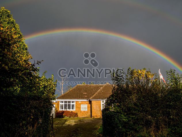 Landscape with rainbow over house - Free image #198237
