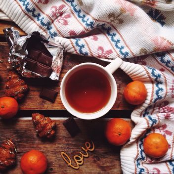 Chocolate, tangerines, tea and Christmas decorations - Free image #198447