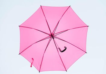 Pink umbrella hanging - image #273067 gratis