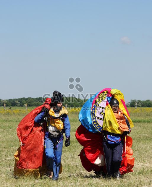 Two men with parachute - Free image #273757