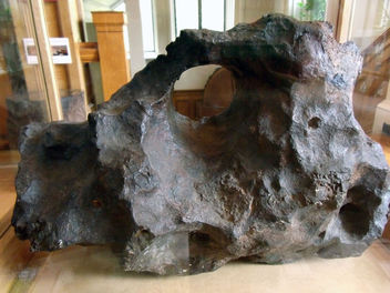 thumper of a Canyon Diablo meteorite with hole - бесплатный image #290897
