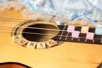 Sugarcubes on guitar fretboard - Free image #326527