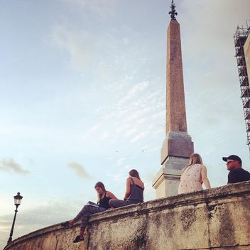 People sitting near Ancient Obelisk in Vatican - image gratuit #331627 