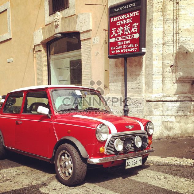 Red Mini Cooper in the street - image gratuit #331957 