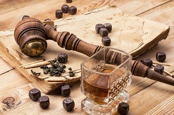 Still life with smoking pipe, chocolate and glass of brandy - image #342487 gratis