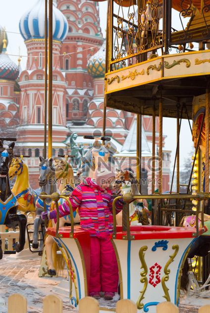 Child riding on carousel on Red Square, Moscow, Russia - бесплатный image #346987