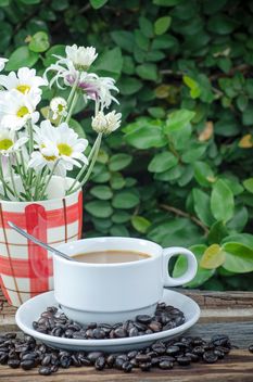 Coffee beans, cup of coffee and flowers - Free image #452397
