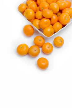 oranges in white plate on white background - Free image #452517
