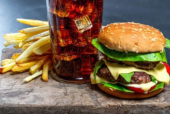 Glass of Cola with ice, French fries and Burger close-up - бесплатный image #464057