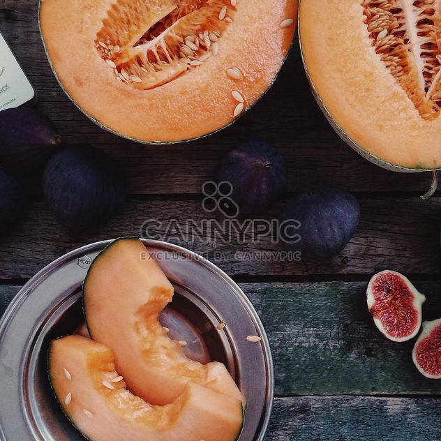 Sliced ripe melon and figs - Free image #136187
