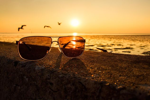Sunglasses on a beach - Free image #136357