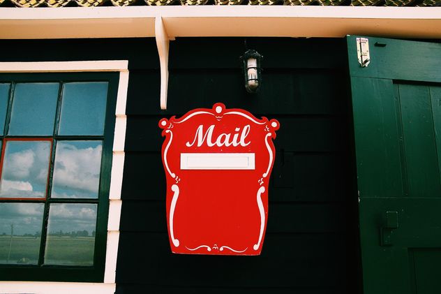 Mail box on wall of house - бесплатный image #136497