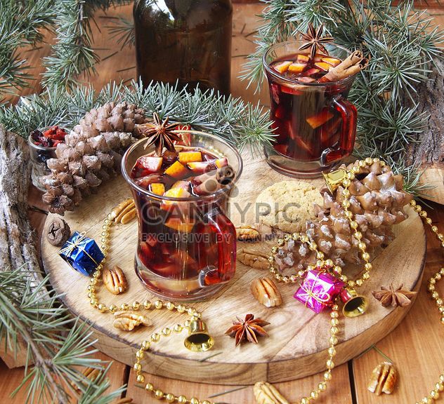 mulled wine in the cup and Christmas decorations - image gratuit #136647 