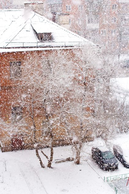 View on houses on winter street of Podolsk - бесплатный image #182637