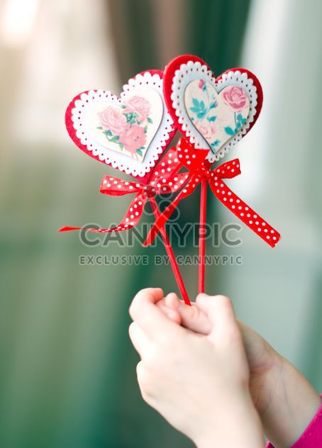 Decorative hearts in hands - image #182677 gratis