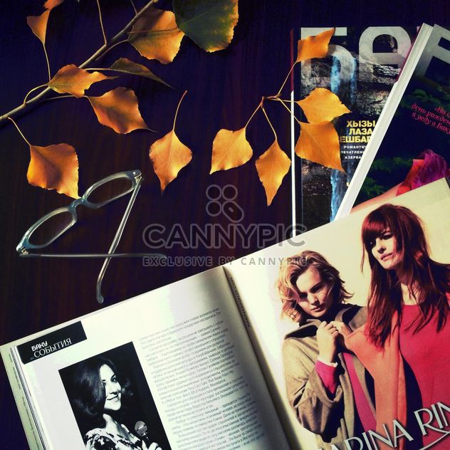 Open magazine, glasses and yellow leaves - Free image #182767