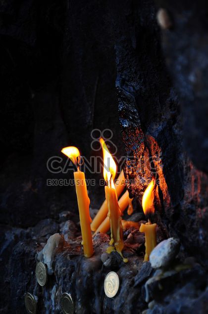 Burning candles and coins - image #182977 gratis