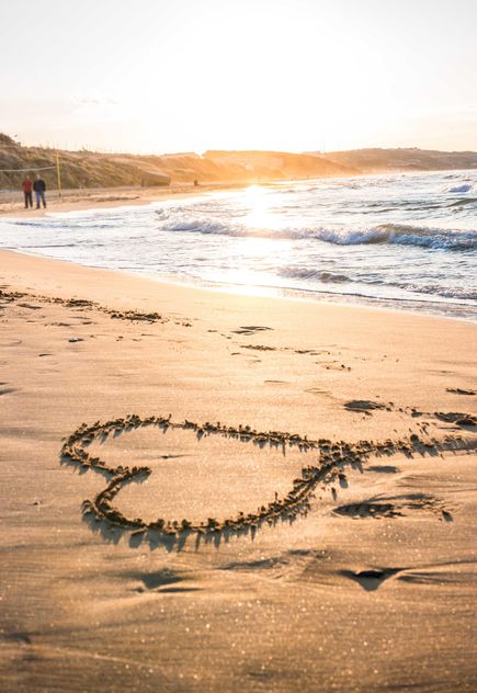 Heart on sand at sunset - image gratuit #182987 