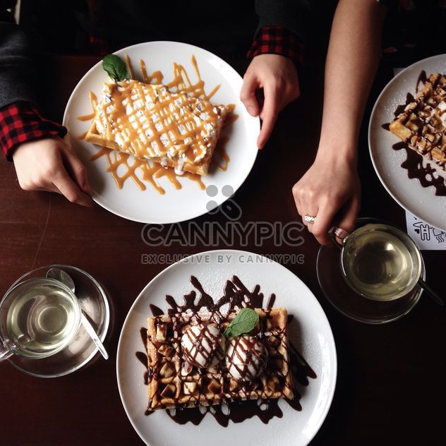 Belgian waffles with banana, ice-cream and chocolate - image #198457 gratis