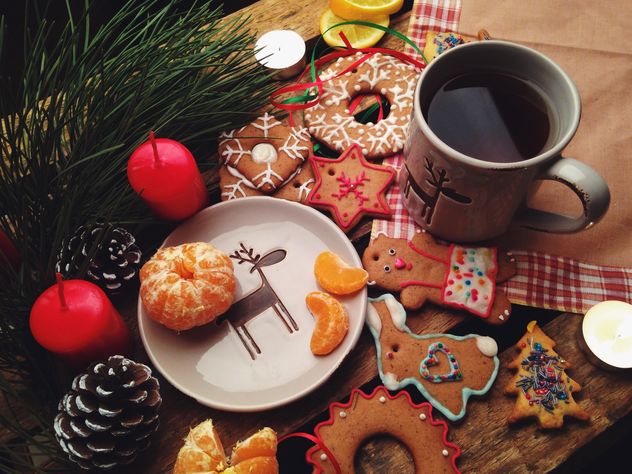 Christmas cookies and tangerines - image #198847 gratis