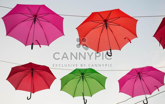 Colorful umbrellas hanging - image #273057 gratis