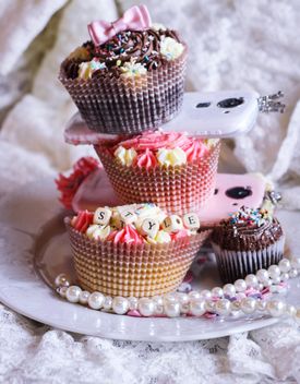 Smartphones with cupcakes - Free image #273777