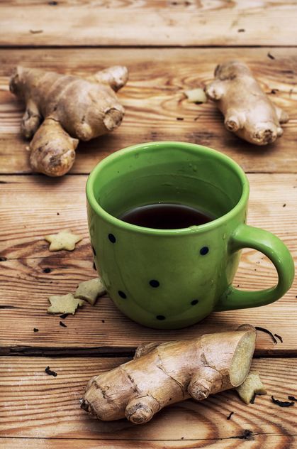 Cup of tea and ginger root - image #302077 gratis