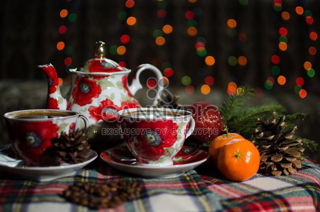Tea and tangerines ball on the table - image gratuit #302307 
