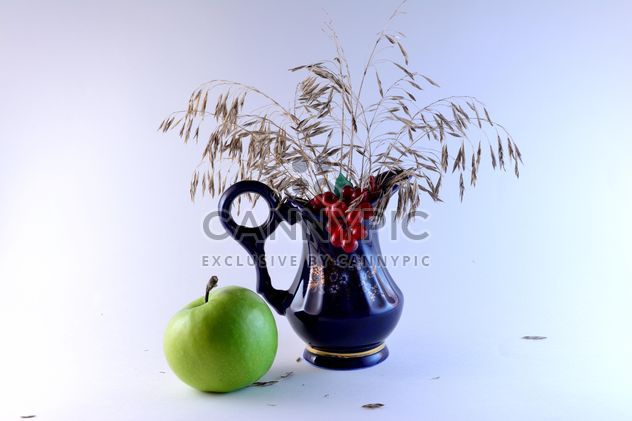 Blue vase and green apple - Free image #303297
