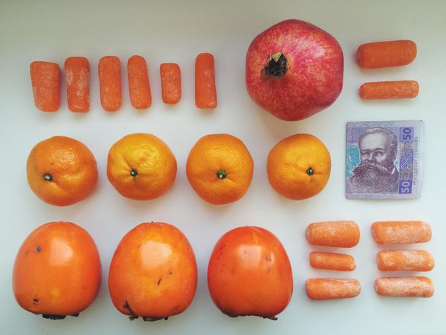 Orange set of vitamins and money on a white background - бесплатный image #304097