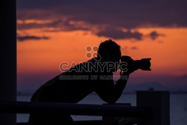 Silhouette of photographer - Free image #329977