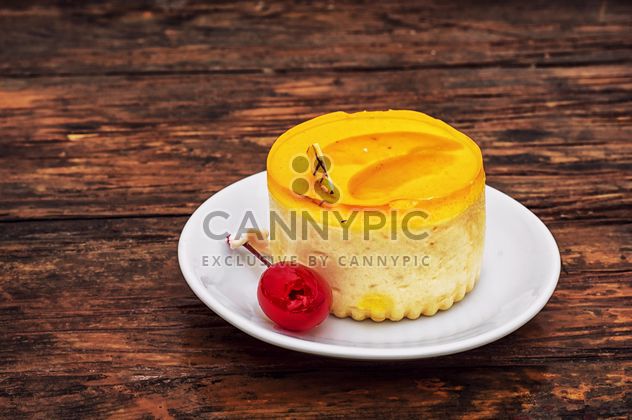 Cake with cherry on white plate - image gratuit #330907 