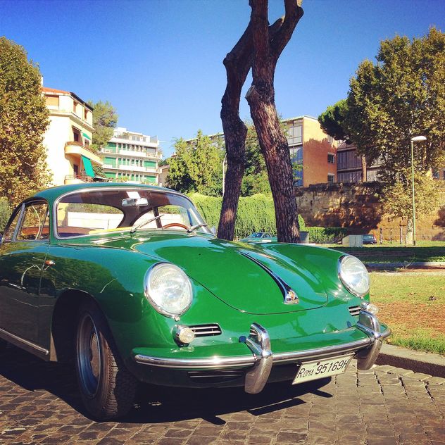 Green Porsche in the street - Free image #331687
