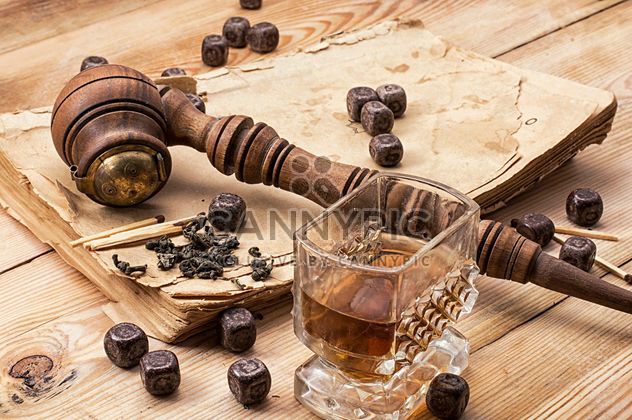 Still life with smoking pipe, chocolate and glass of brandy - image #342487 gratis