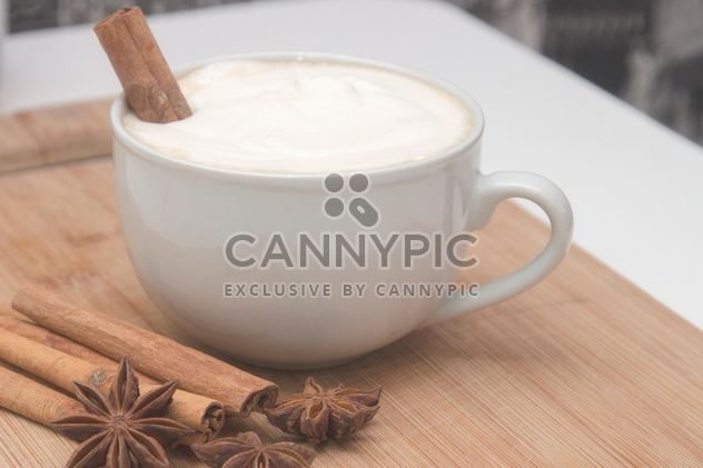 Cup of cappuccino and spices - image #350297 gratis