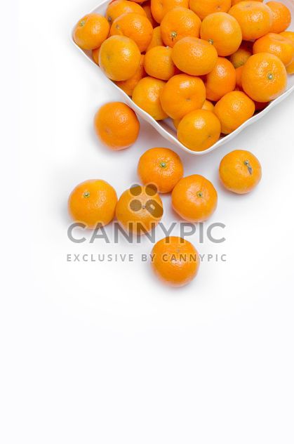 oranges in white plate on white background - Kostenloses image #452517